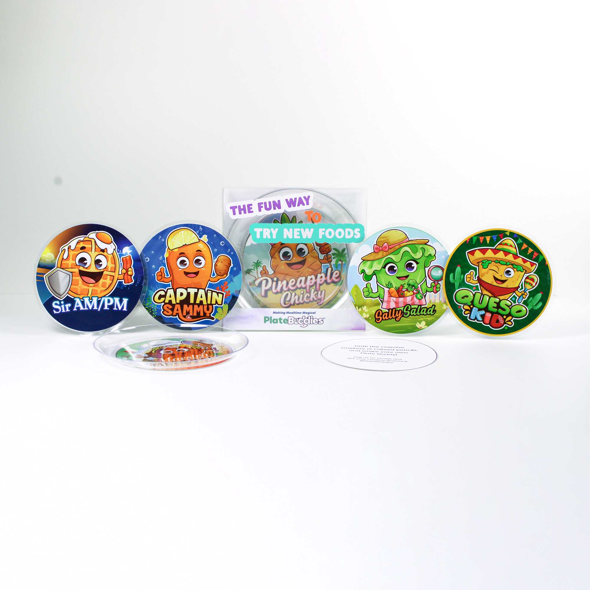 Plate Buddies Starter Kit flat-lay with all six Buddy mats, clear play-plate, day-of-the-week stickers, and Create Your Own card